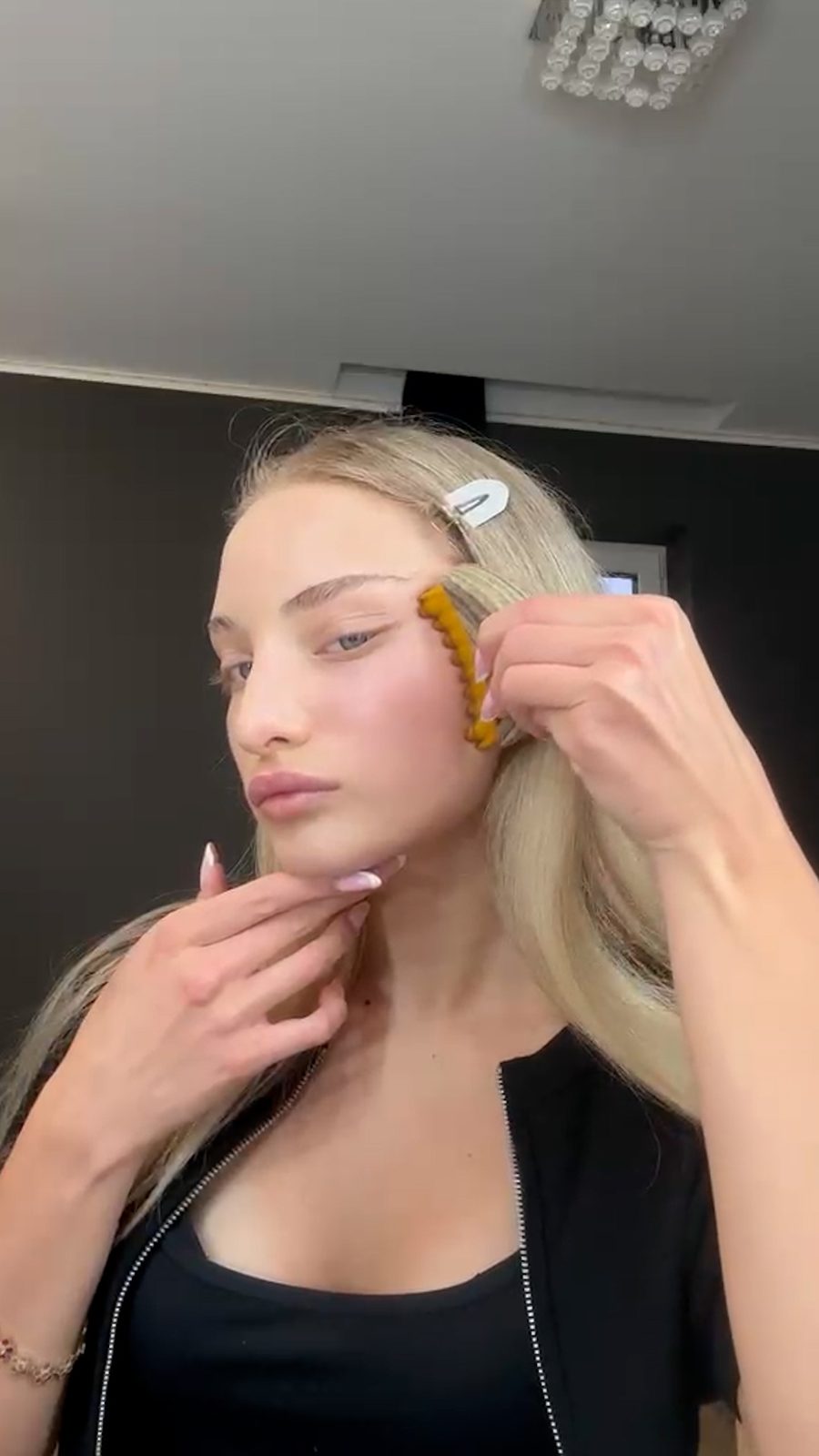 Brushing the face on dry skin